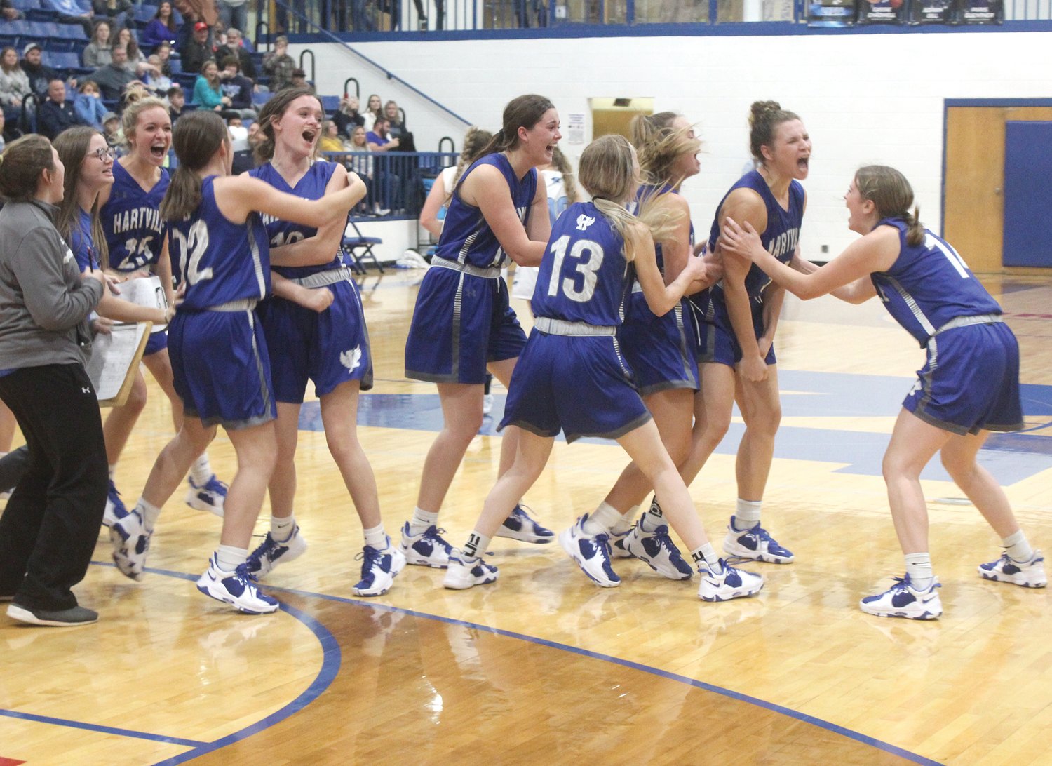 McKinley Sanders and her teammates are pumped after the winning shot.